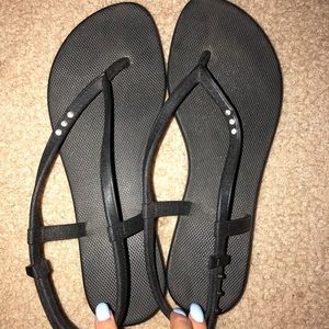 black rubber sandals
